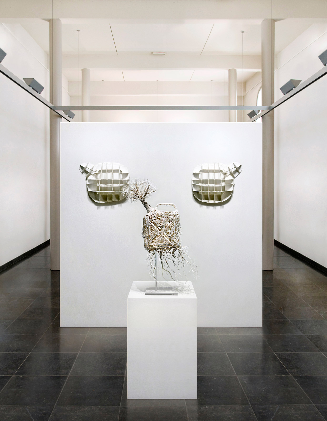 two sculptures artwork exhibit by Tanya Vogelzang called "Bonsai"